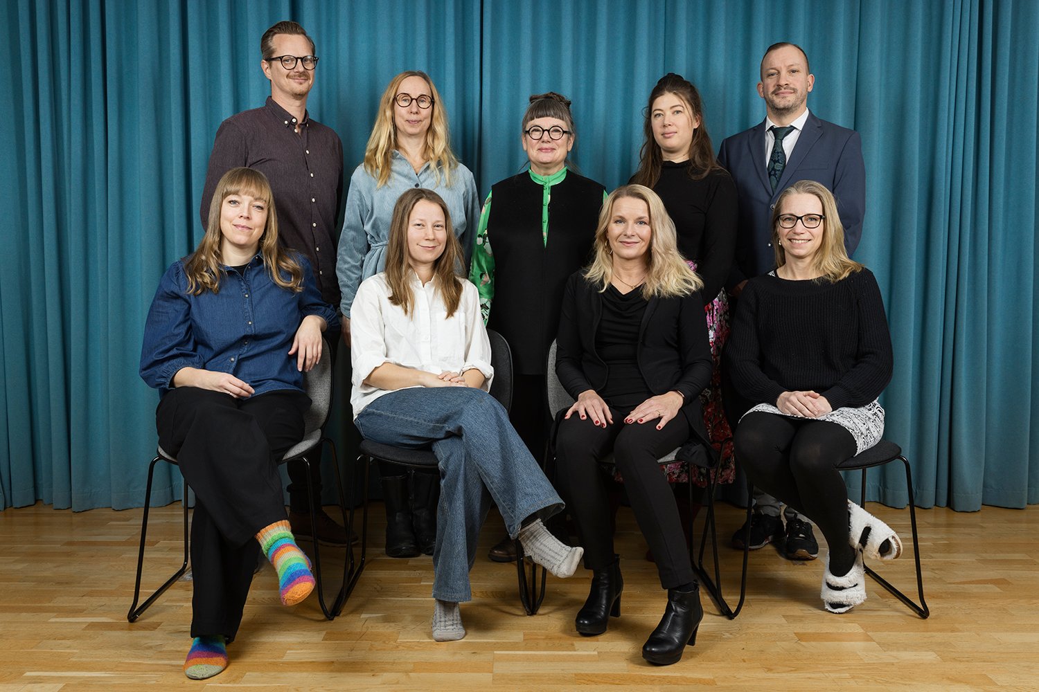 Gruppbild på nio personer.